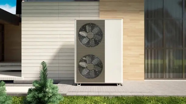 Unité extérieure de pompe à chaleur air/eau installée contre une façade